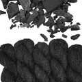Photo showing yarn and charcoal Woolly Headed Ideas Sport Weight Wool and Hemp Hand Dyed Yarn in Colorway Charcoal