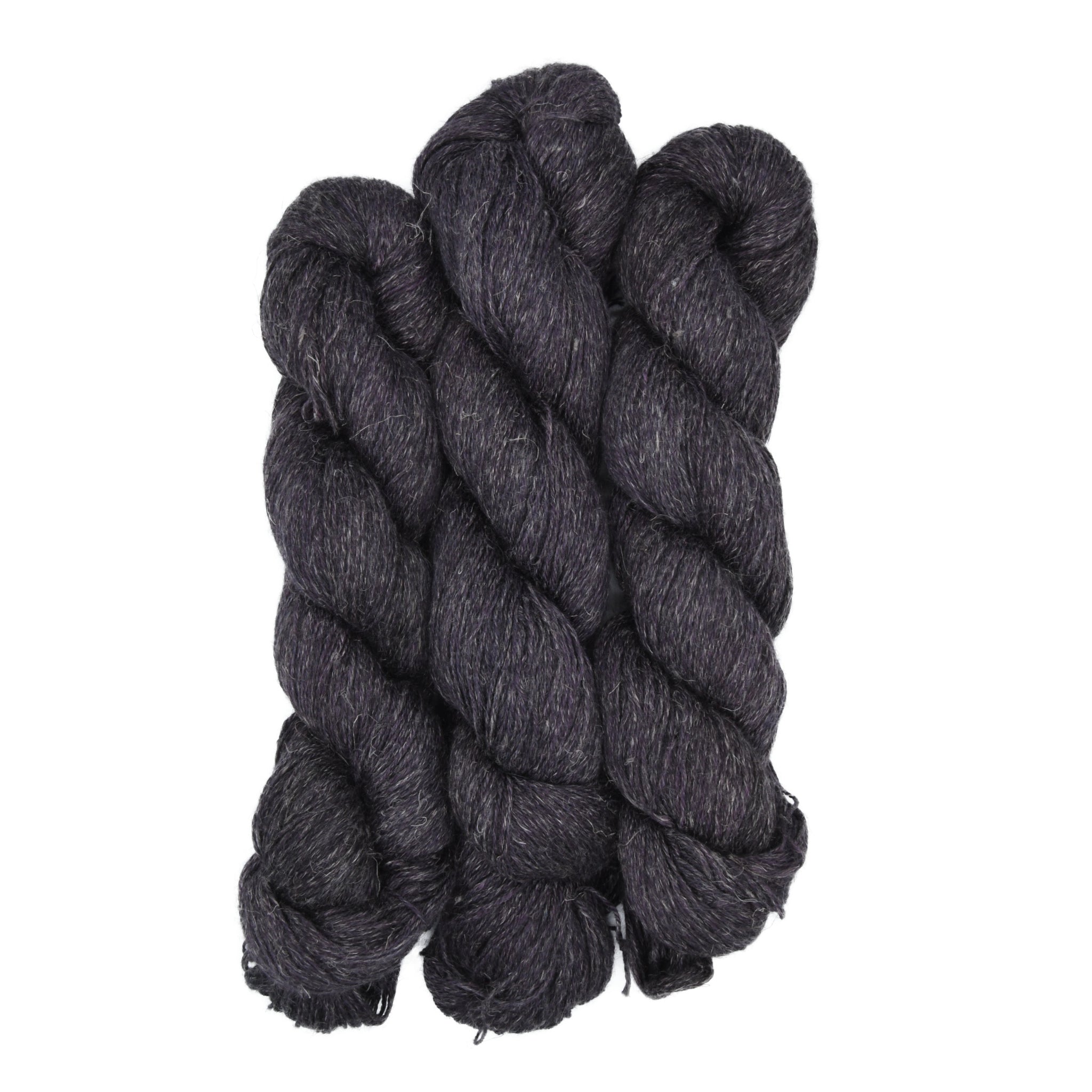 Three skeins of dark brown yarn on a white background