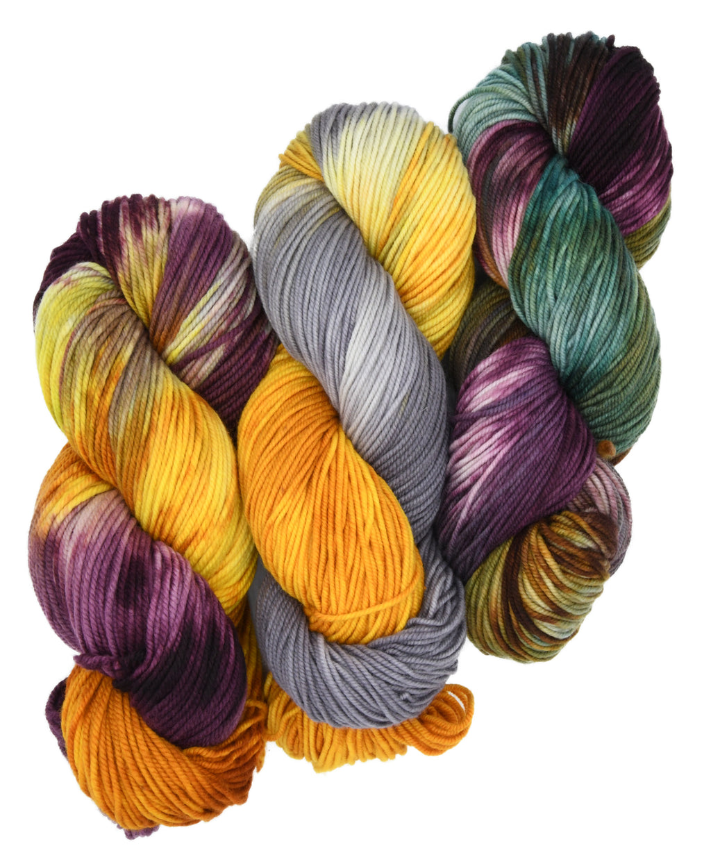 Colorway pairing of Three skeins of Woolly Headed Ideas hand-dyed multicolored yarn on a white background