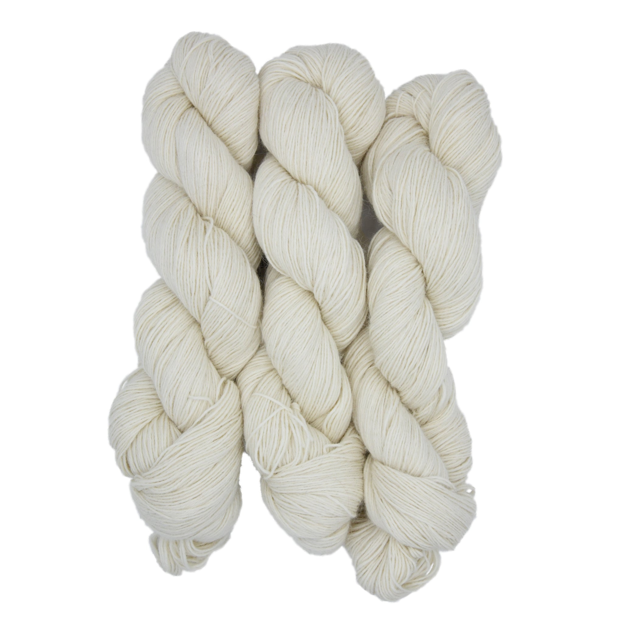 Three skeins of white yarn twisted together on a white background