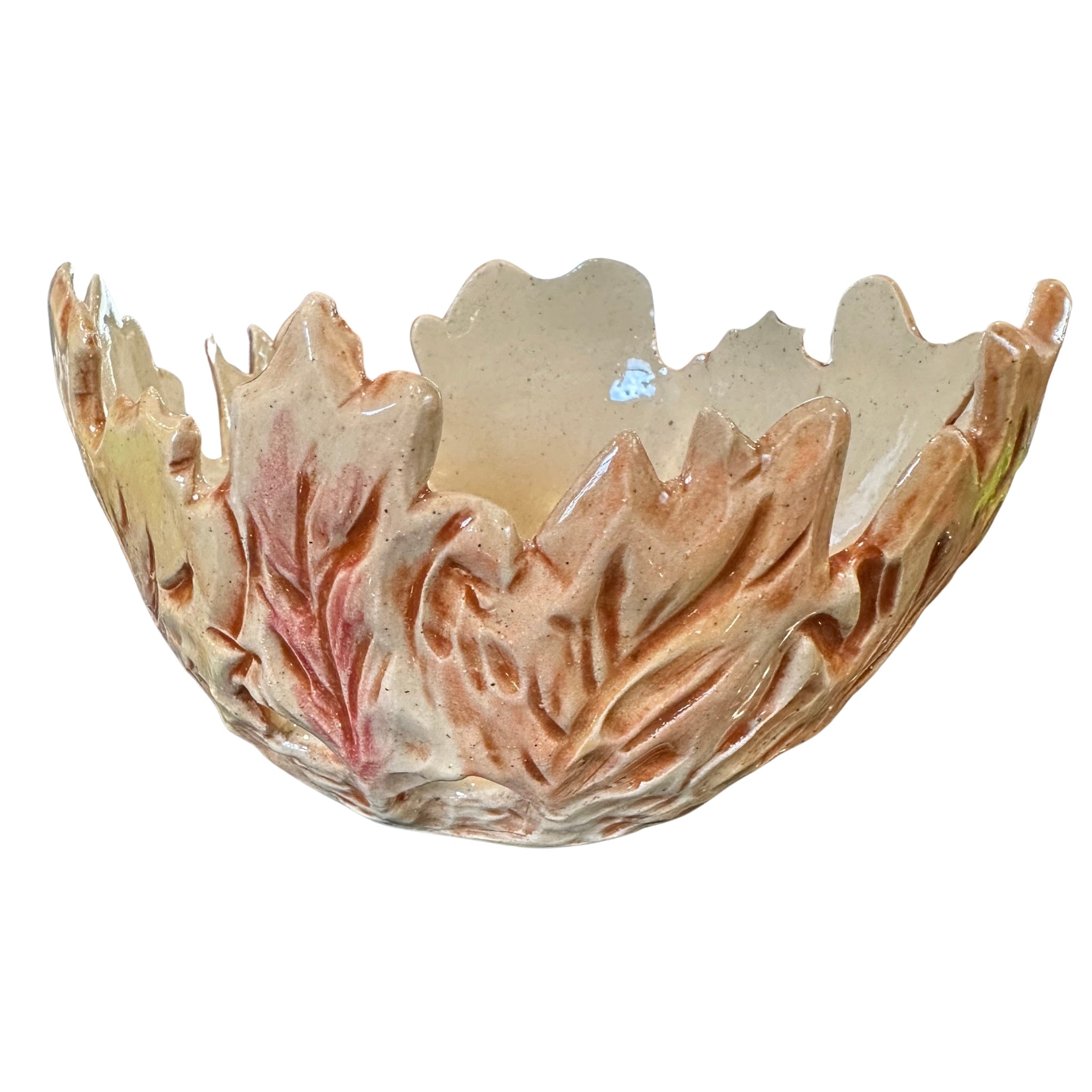 A decorative ceramic bowl with a leaf-like, scalloped rim and raised leaf textures, shown on a plain white background.