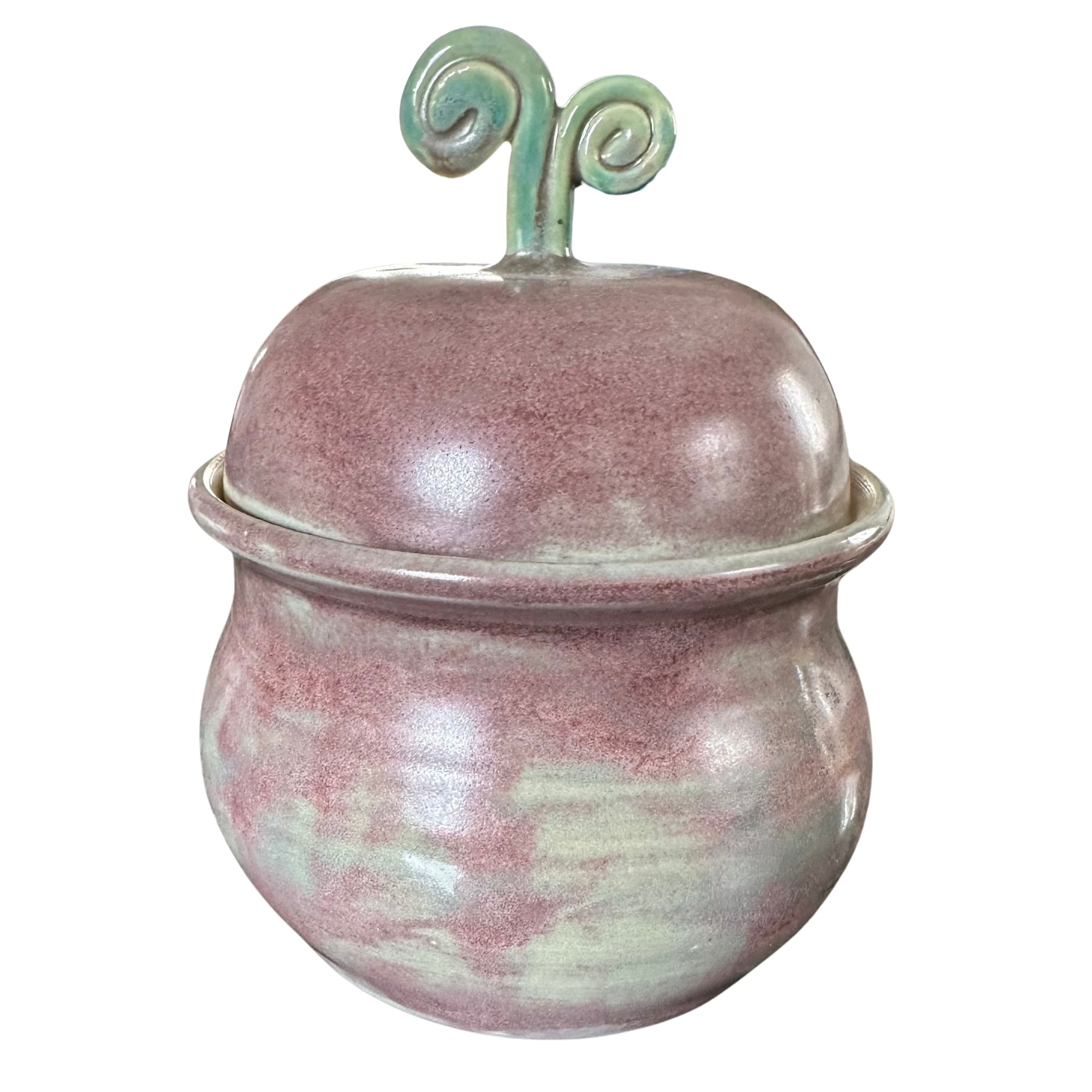 Purple and green ceramic jar with a sprout for an handle on the lid
